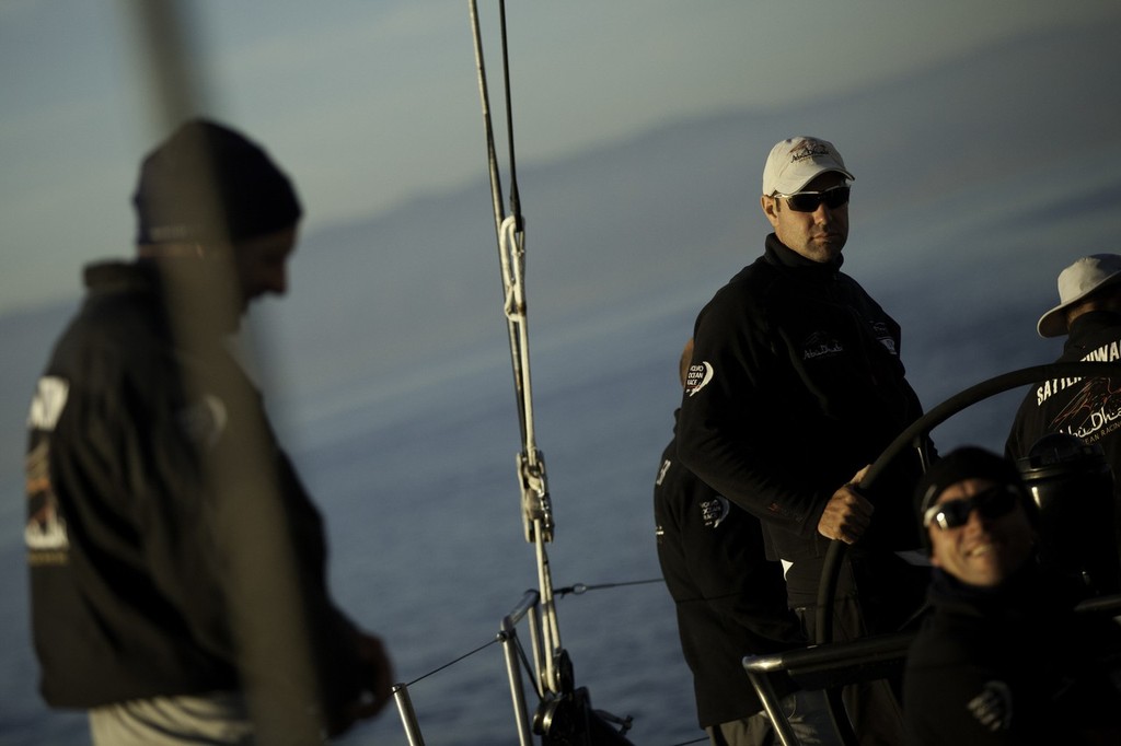 Simon fisher helming Abu Dhabi Ocean Racing during leg 1 of the Volvo Ocean Race 2011-12, from Alicante, Spain to Cape Town, South Africa.  © Nick Dana/Abu Dhabi Ocean Racing /Volvo Ocean Race http://www.volvooceanrace.org
